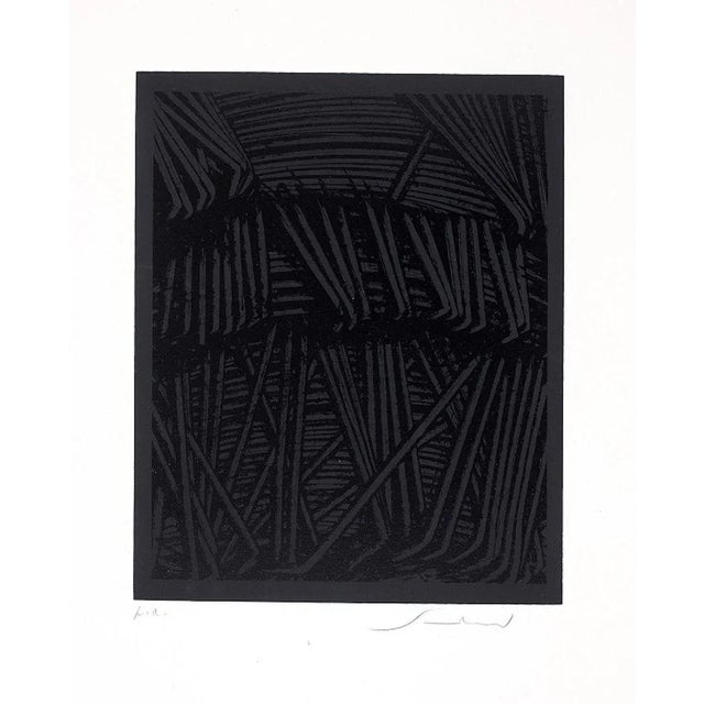 Tramatura is an original print realized by Emilio Scanavino in 1971 Black screen print on paper. Hand-signed in pencil on...