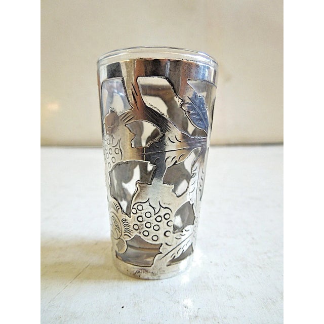 A set of six vintage shot glasses - from the 1950's. Bottom of each shot glass is stamped: STERLING, 925, LHM (maker) and...