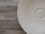 Oversize Round Ceramic Decorative Bowl by Marcel Wanders for Bb Italia. Tone-on-tone, beige color. Size: 20.5"D x 2"H