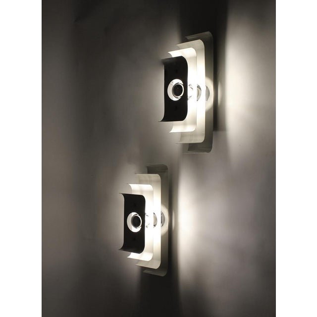 Italian Postmodern Wall Sconces in Layered Metal, 1970s, Set of 2, in Good conditions. Designed 1970 to 1979 Up to 250V...