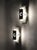Italian Postmodern Wall Sconces in Layered Metal, 1970s, Set of 2, in Good conditions. Designed 1970 to 1979 Up to 250V...