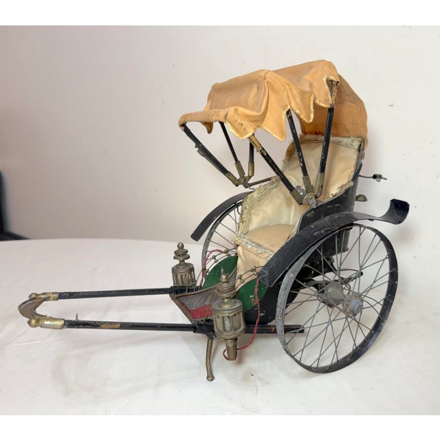 This antique 19th century handmade mixed media running rickshaw is a unique and intricately crafted piece of art done by...