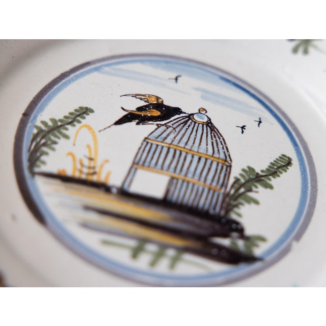 18th Century 18th Century Nevers Polychrome Tin-Glazed Faïence Earthenware Plate, Bird and Cage For Sale - Image 5 of 7