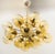 Italian oval shaped sputnik chandelier with 24 amber Murano glass globes carefully hand blown with bubbles inside the...