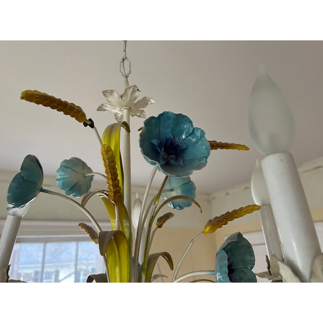 Italian Mid-Century tole five light chandelier with gathered blue flowers, grasses and wheat stalks. Hangs 38 3/4" down...