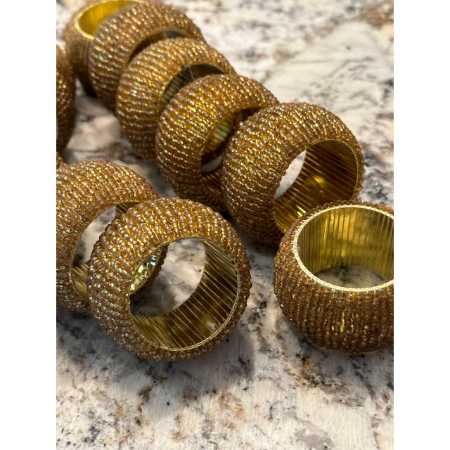 Large set of 12 gold beaded napkin rings. Add some bling for everyday or a touch of elegance on special occasions to your...