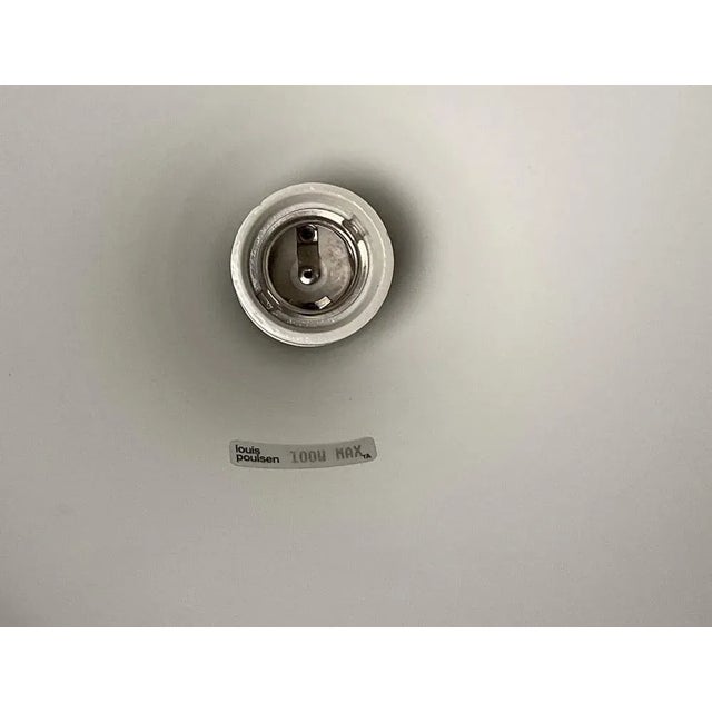 New fabric cord. White lampshade. Original finish This piece has an attribution mark, I am sure that it is completely...