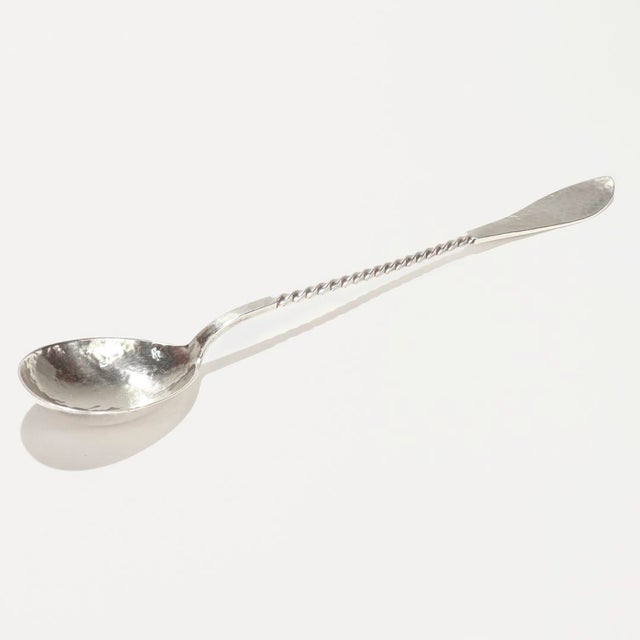 A fine cocktail spoon or stirrer. By Shreve & Co. of San Francisco, California. In sterling silver. With an elongated...