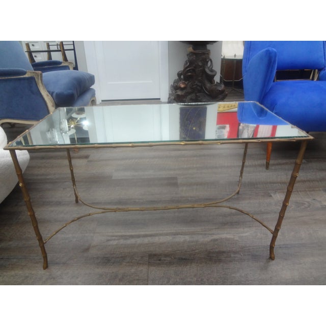 French Maison Baguès Bronze And Mirror Coffee Table. This elegant French Maison Bagues attributed Louis XVI style faux...