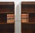 A handsome pair of mahogany waterfall bookcases. Each piece is designed with three graduated open shelves, their sides...