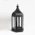 A Moorish dark iron lantern with a black finish.