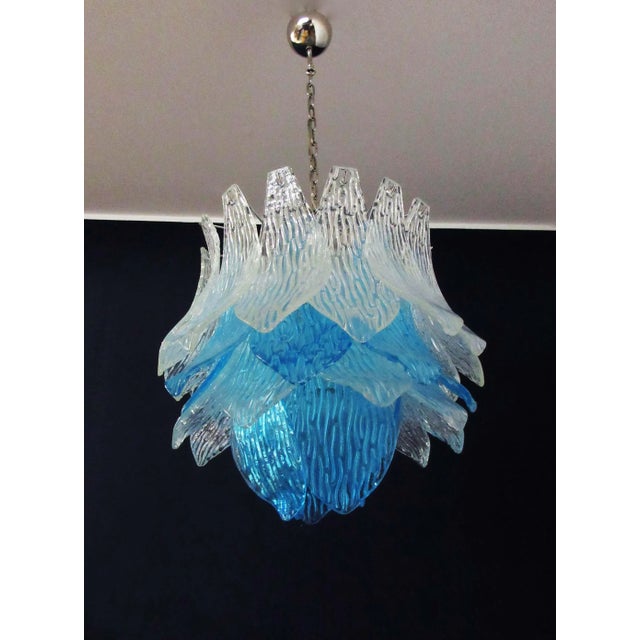 Beautiful and huge Italian Murano Chandelier composed of 38 splendid trasparent and blue glasses that give a very elegant...
