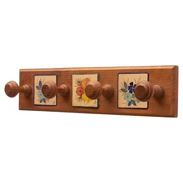 Vintage Hand-Painted Ceramic and Wood Hanger by Catalan Artist Diaz Costa – circa 1960, Spain Discover the timeless...