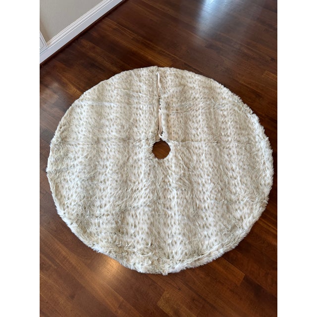 Luxe Faux Lynx Fur Pottery Barn Tree Skirts backed with Velvet and Velvet Tie Closures. Two available. Priced...