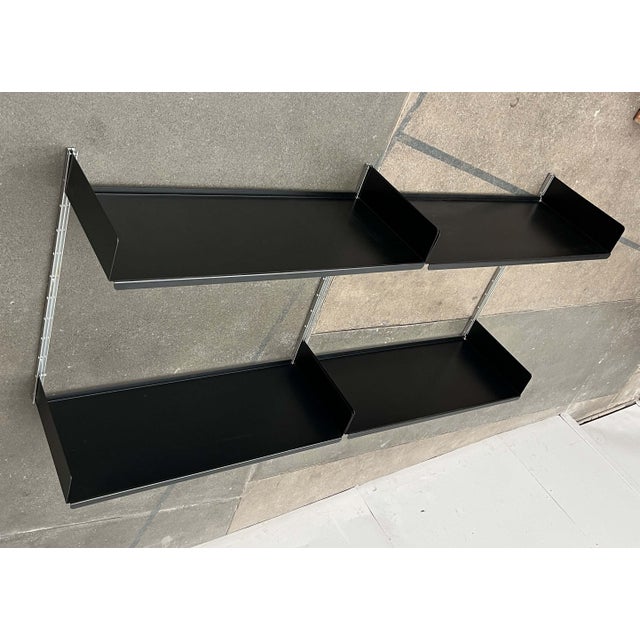 Modular shelving system by Vitsoe, designed by Dieter Rams in the late 1950s. A minimalist design classic that speaks for...