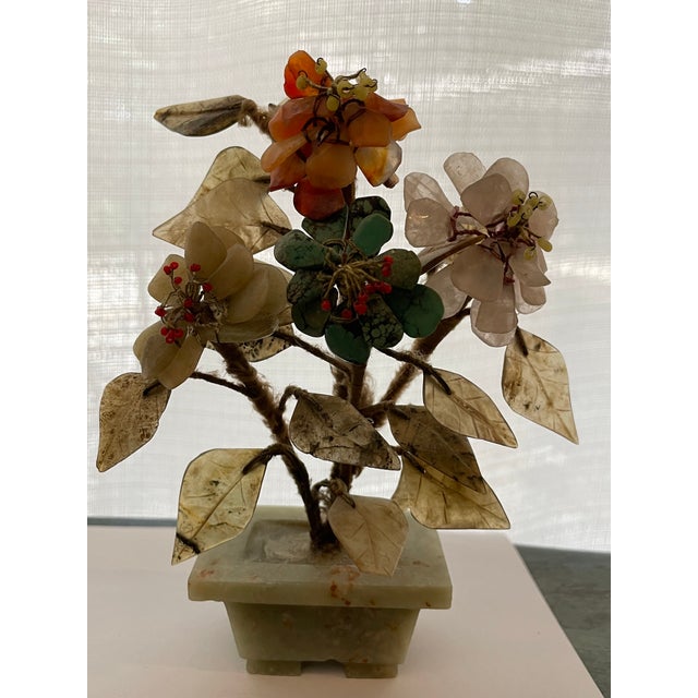 Miniature hard stone Chinese jade tree with carnelian showy bloom and sage green hard stone pot- base. The miniatures are...