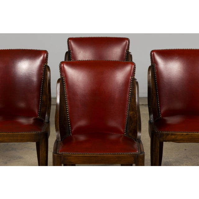 A refined set of six 1930s French Art Deco dining chairs, sourced directly from Provence. Each chair is masterfully hand-...