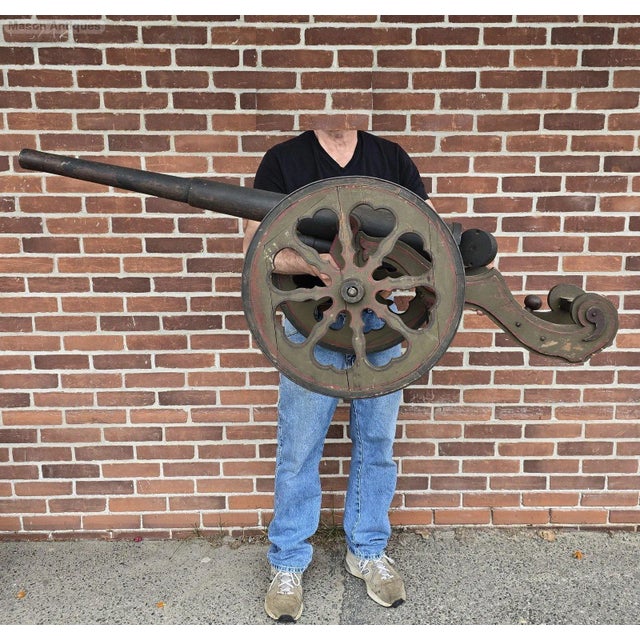Exceptional antique handmade decorative wooden cannon in original paint.