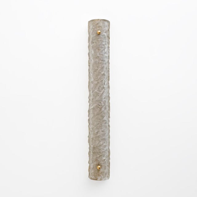 These wall lights are made of textured Murano glass with a scavo effect, a type of ornamental glass with a rough and...