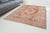 Add a touch of timeless elegance to your home with this beautiful, handwoven vintage Turkish rug. Featuring a striking...