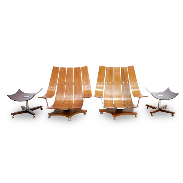 Magnificent Pair of 'Low Rider' G Plan Teak Housemaster Chairs and Footstools by K M Wilkins Circa 1970. The chairs...