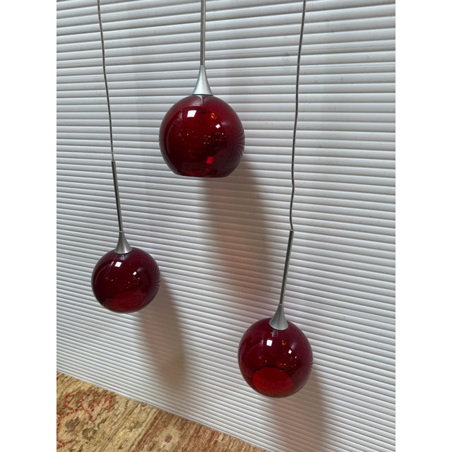 Design Plus Gallery presents a Set of Three Bobo Pendant Lights from Bruck Lighting. The company, known for its...