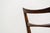 Set of four chairs designed in Denmark in the 1960s by Niels Kofoed. Made of walnut, they consist of a high backrest...