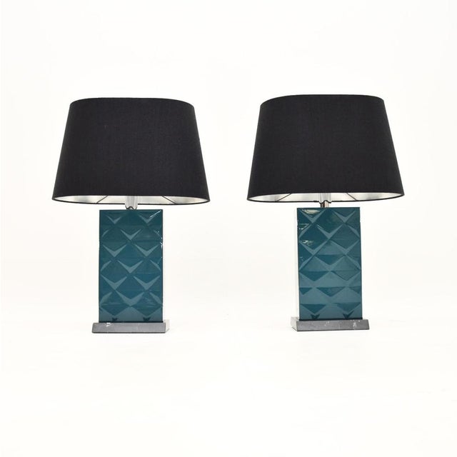 A superb pair of toblerone table lamps by Oitoemponto. They were hand made in Portugal by the high end design studio...