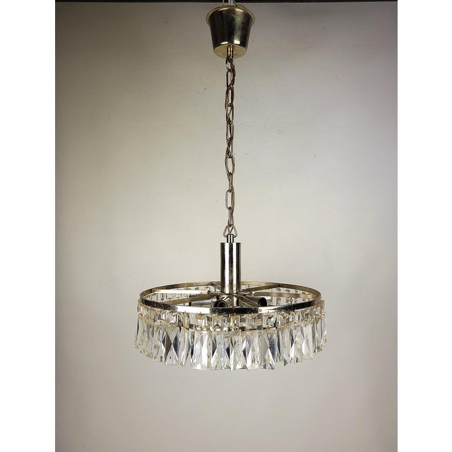 Crystal Chandelier, 1970s, in Worn conditions. Designed 1970 to 1979 Up to 250V (Europe/UK Standard).The wiring of this...