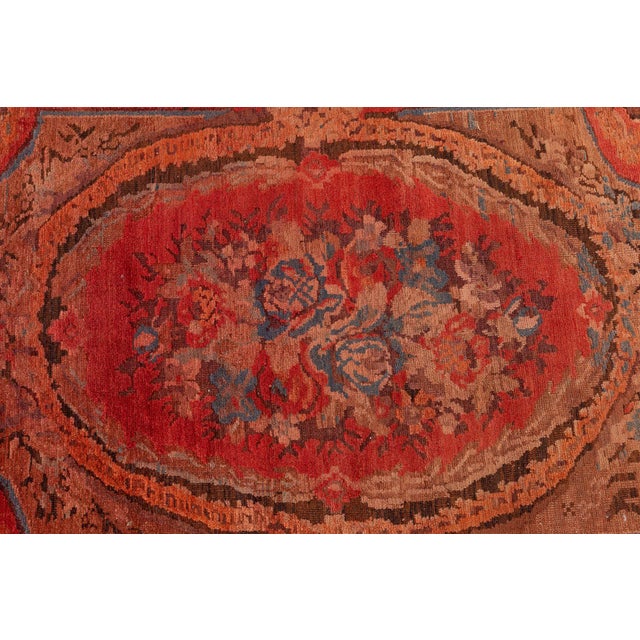 This exceptional antique Karabagh rug, dating to the early 1900s, exemplifies the refined elegance and decorative boldness...