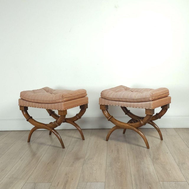 A pair of walnut Neoclassical benches, France, 19th century.