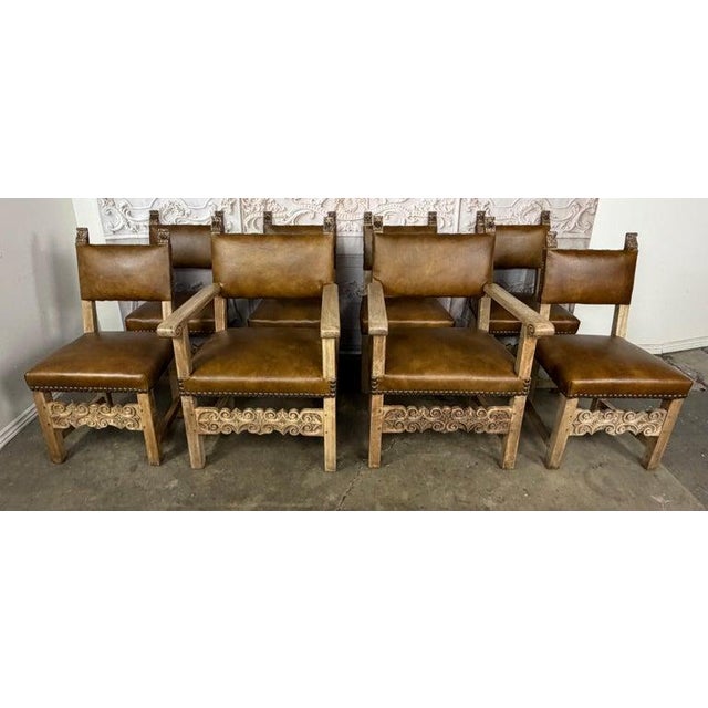 An exceptional and highly coveted set of eight Spanish Colonial Revival chairs, comprising two armchairs and six side...