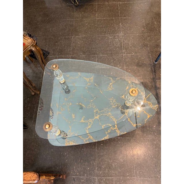 Elegant Goran of Belgium side tables featuring smoked and clear glass shelves, faceted crystal supports, and fluted brass...
