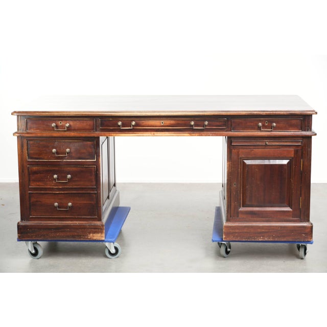 This 20th-century wooden desk/partner desk is in English style and has a beautiful, luxurious appearance. The place where...