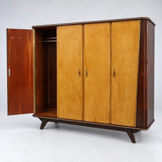 Vintage 4-door wardrobe from the 1950s. Add character to your interior with this beautiful vintage wardrobe from the 1950s...