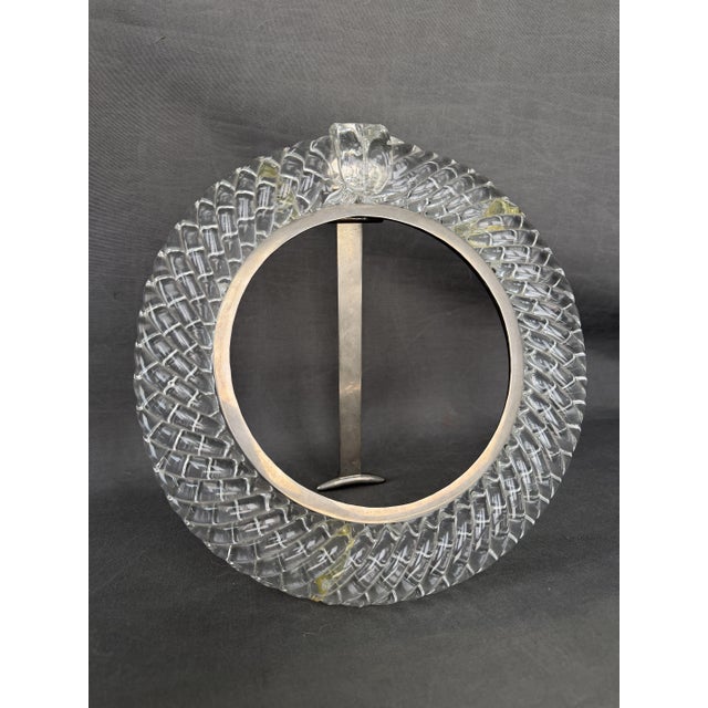 Carlo Scarpa for Venini. Antique and original Loewe mirror frame. Exterior dimensions: 31 cm. Glass width: 4.7 cm....