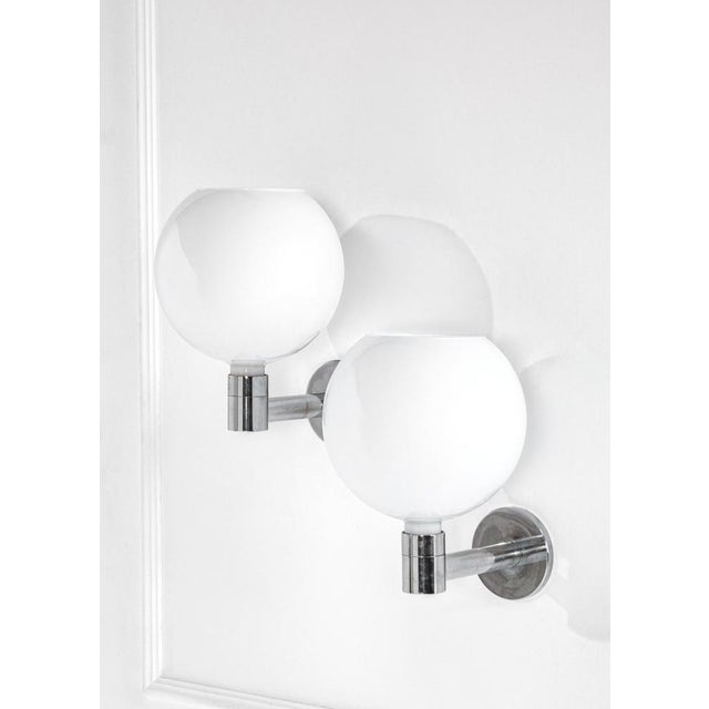 Wall Lamps with Spherical Opal Glass Diffusers by Franco Albini for Sirrah, 1970s, Set of 2, in Very Good conditions....