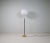 This lamp was made in sweden at falkenbergs belysning. Wonderful, assembled brass combination with leather rod. The brass...