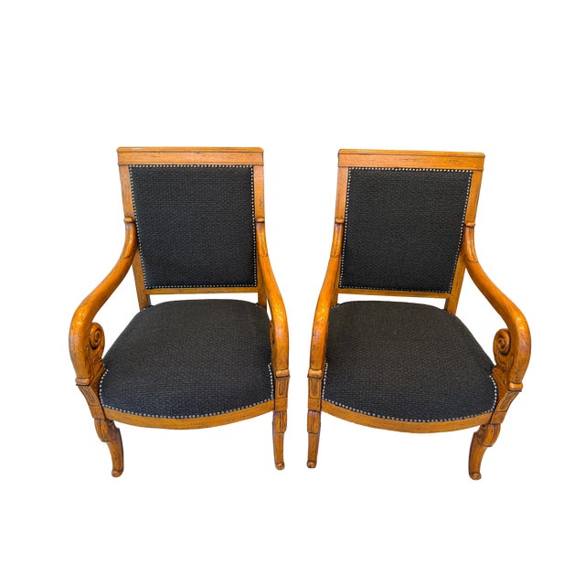 An exceptional pair of 19th C Biedermeier period armchairs originating from Southern Germany circa 1830-1835. Crafted with...