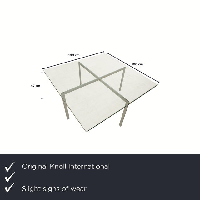 The Barcelona table by Knoll International is made of thick crystal glass and stands on a chrome-plated frame. This glass...