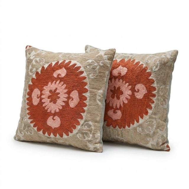 This beautiful 26'' x 27'' & 27'' x 28'' hand-embroidered Suzani pillow cover set was made from authentic Uzbek cotton...