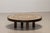 Round coffee table designed by Roger Capron in France around 1970. This table features a solid wooden frame and a table...