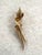 Gorgeous Goldtone Garnet and Cubic Zirconia Cali-lily stick pin by Sarah Coventry. Founded in 1949, the company did not...