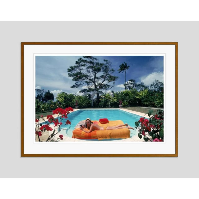 Modern Sunbathing in Barbados 1976 by Slim Aarons Framed C-Print For Sale - Image 3 of 3