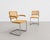 Marcel Breuer Cesca styled Mid Century Modern dining chairs, a Pair. The frames are constructed of tubular steel and the...