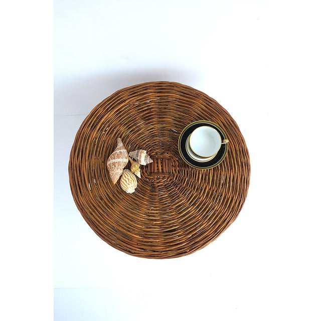 A round European wicker side or end table with hourglass design, circa mid-20th century, 1960s, 1970s, Europe, Yugoslavia...