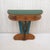 A beautiful console table whose lines are attributed to designer Osvaldo Borsani. Elegant and highly functional, it is...