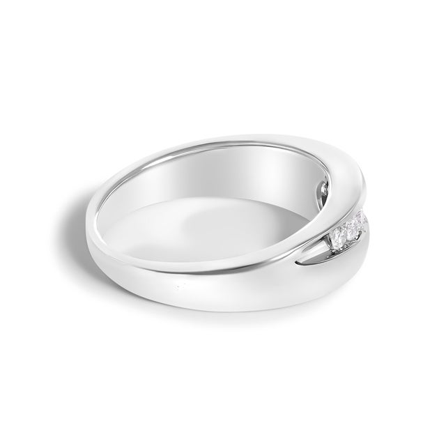 Immerse yourself in the understated elegance of this .925 sterling silver men's ring, where contemporary design meets the...