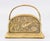 A superb English Edwardian repoussé brass letter rack, circa 1930. It has a charming fish and stylized foliate design with...