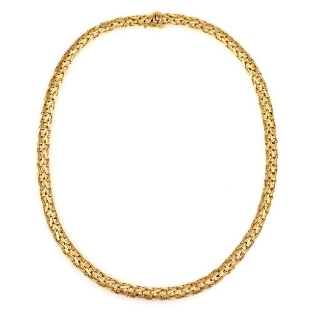 This lovely authentic necklace is by Roberto Coin from their SILK collection. It is crafted from 18k yellow gold featuring...